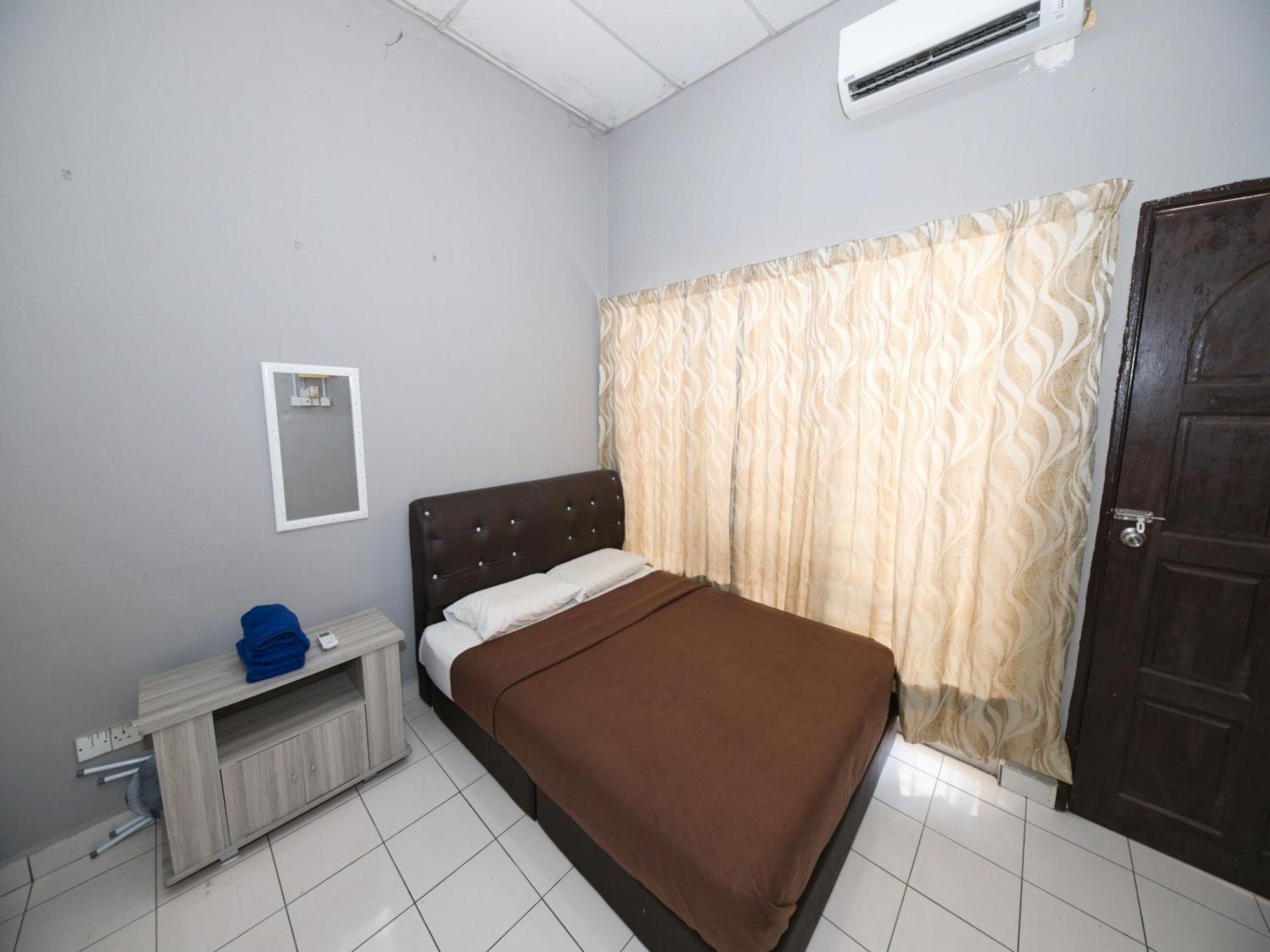 Oyo 91011 Iman Roomstay Gua Musang Exterior foto