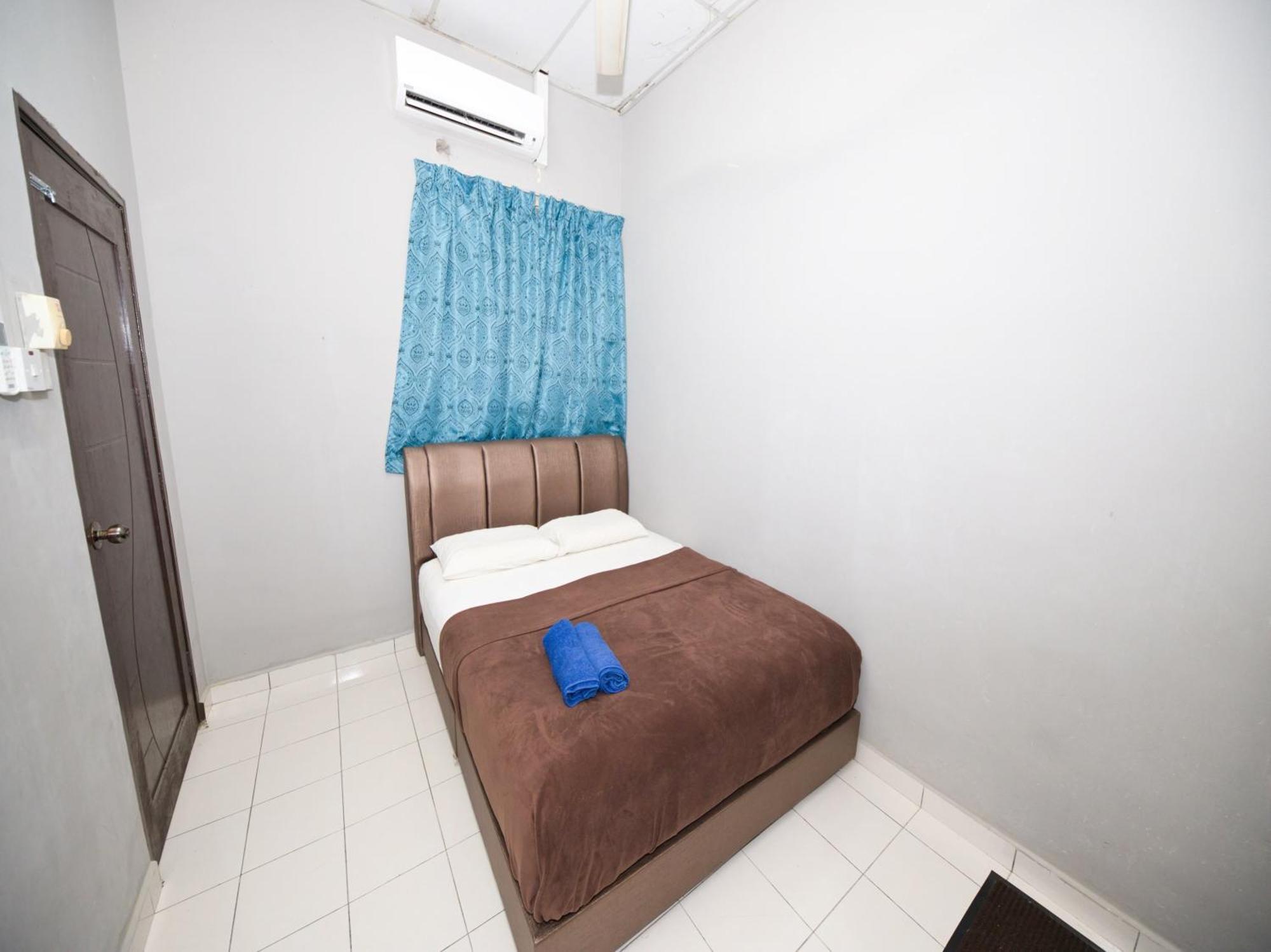 Oyo 91011 Iman Roomstay Gua Musang Exterior foto