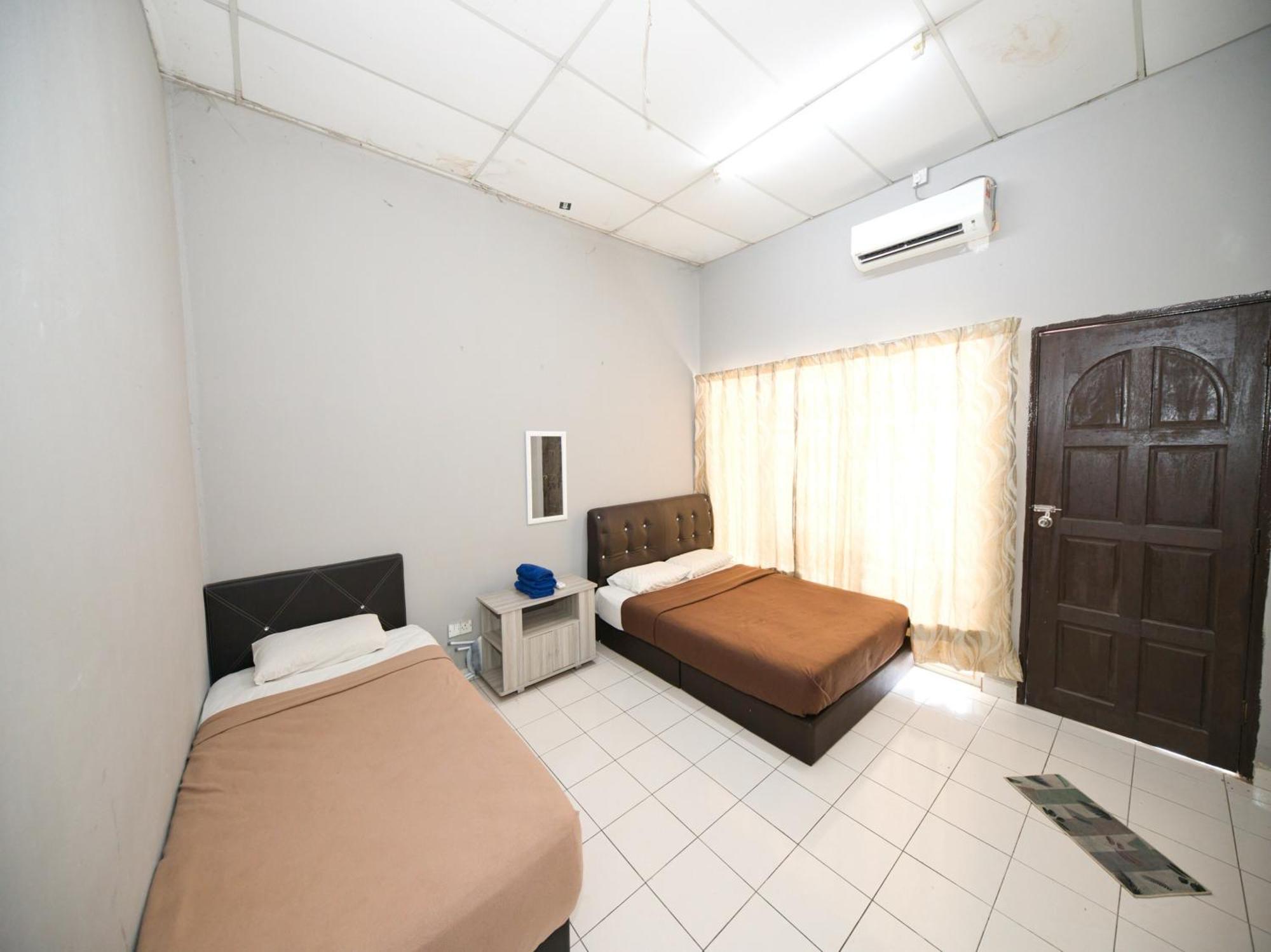 Oyo 91011 Iman Roomstay Gua Musang Exterior foto